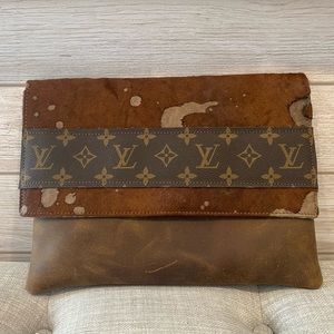 Re-mastered Louis Vuitton cow hyde clutch and crossbody brand new